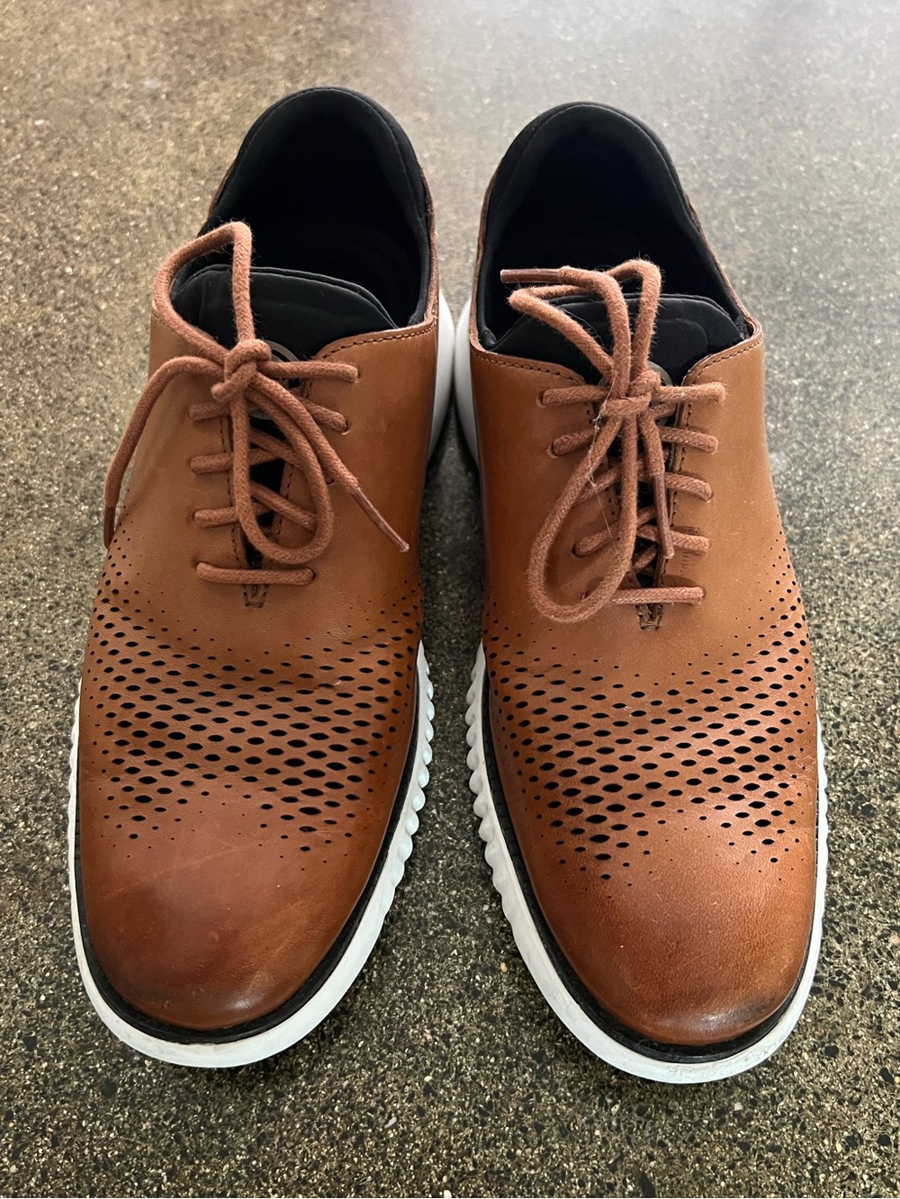 Cole Haan Zerogrand laser wingtip oxfords in British Tan | Ivory